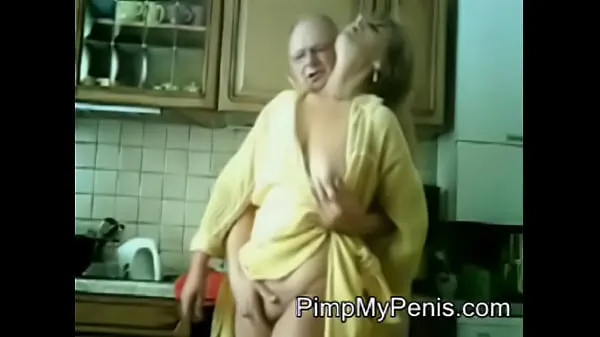 Watch old couple having fun in cithen warm Clips