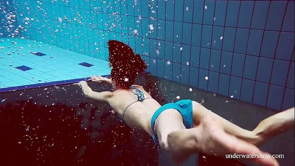 Watch Martina swims naked with her sexy body warm Clips