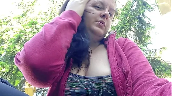 Watch Nicoletta smokes in a public garden and shows you her big tits by pulling them out of her shirt warm Clips